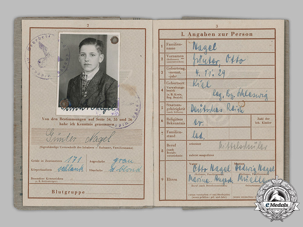 germany,_hj._a_wehrpaß_and_documents_to16_year_old_günter_nagel,_april1945_m19_5975
