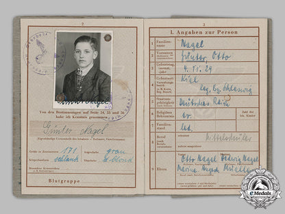 germany,_hj._a_wehrpaß_and_documents_to16_year_old_günter_nagel,_april1945_m19_5975