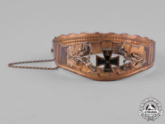 Germany, Imperial. A Trench Art Bracelet With Oak Leaves And Miniature Iron Cross