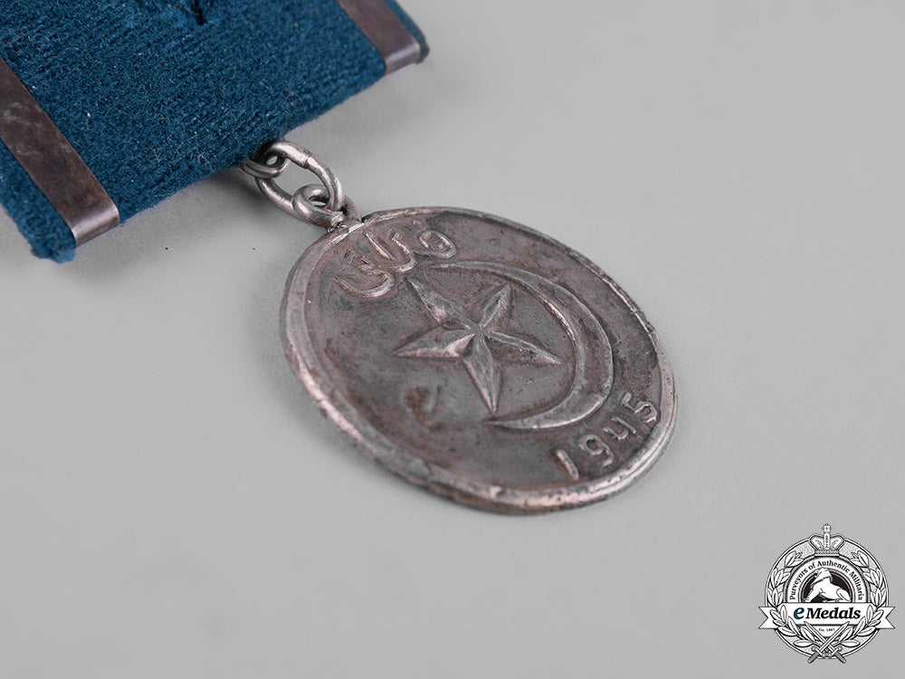 east_turkestan,_ii_republic._a_medal_for_unselfishness,_c.1945_m19_8321
