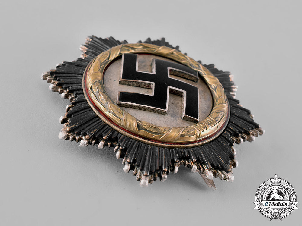 germany,_wehrmacht._a_cased_german_cross_in_gold_by_otto_klein&_co.,_with_personal_effects,_to_erich_jeckstat_m19_8346
