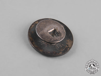 germany,_nsdap._a_party_member’s_buttonhole_badge,_by_fritz_zimmermann_m19_9436