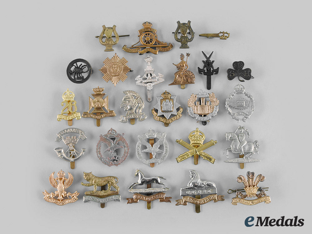 united_kingdom._a_lot_of_twenty-_six_second_war_era_regimental_cap_badges_m20_01285_1