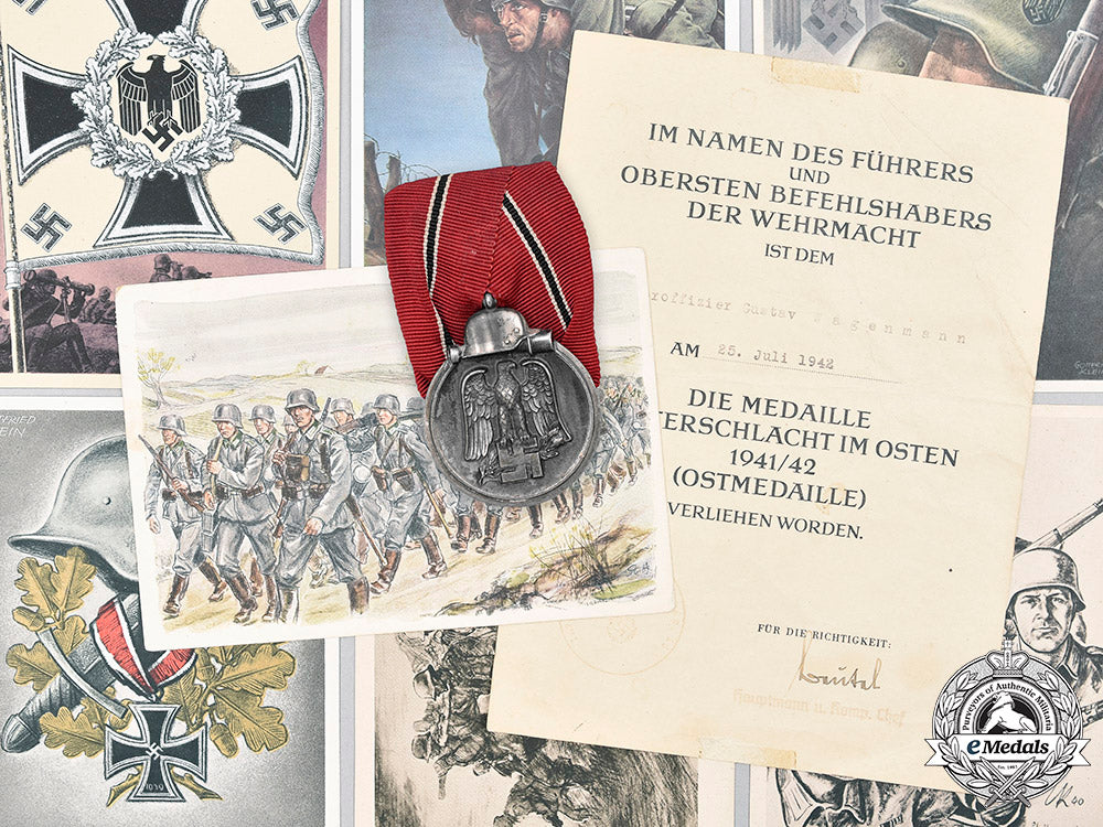 germany,_wehrmacht._an_eastern_front_medal_and_award_document,_with_commemorative_postcards_m20_1299