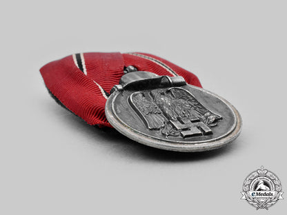 germany,_wehrmacht._an_eastern_front_medal_and_award_document,_with_commemorative_postcards_m20_1303