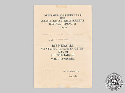 germany,_wehrmacht._an_eastern_front_medal_and_award_document,_with_commemorative_postcards_m20_1304