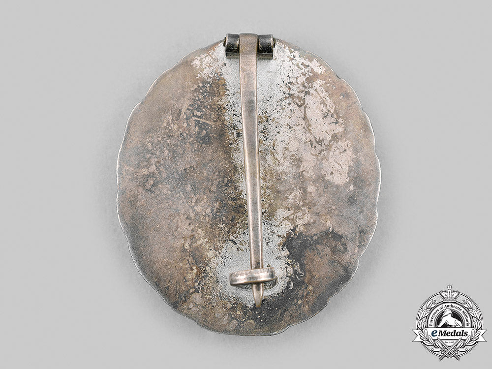 germany,_wehrmacht._a_silver_grade_wound_badge,_first_pattern,_with_case_m20_1804_mnc5835