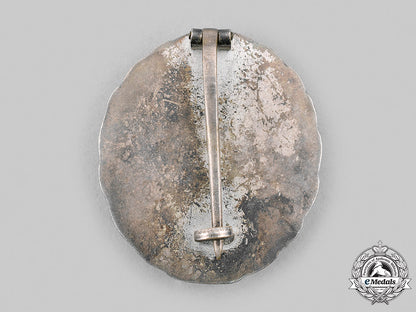 germany,_wehrmacht._a_silver_grade_wound_badge,_first_pattern,_with_case_m20_1804_mnc5835
