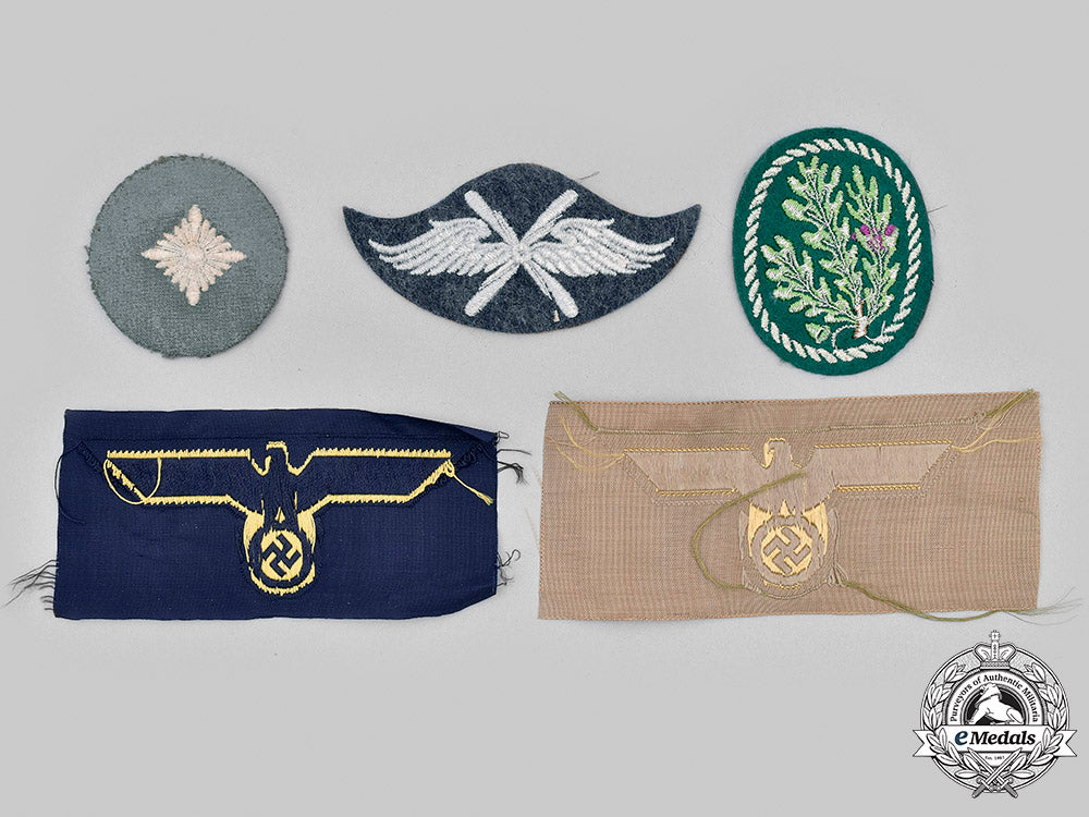 germany,_wehrmacht._a_lot_of_uniform_insignia_m20_2273_mnc8192_1_1