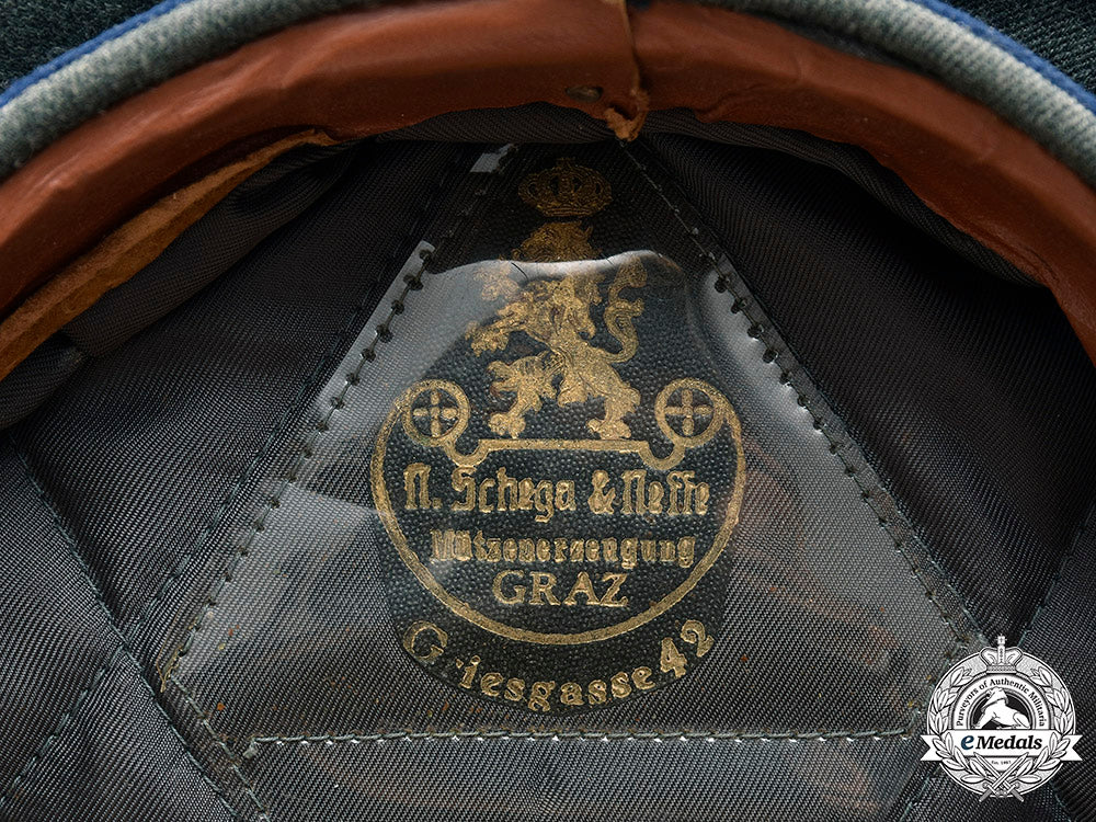 germany,_heer._a_medical_officer’s_visor_cap,_by_n._schega&_neffe_m20_2814_mnc5543_1