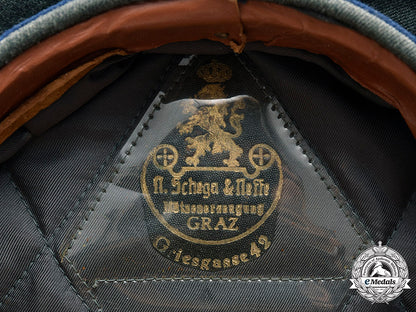 germany,_heer._a_medical_officer’s_visor_cap,_by_n._schega&_neffe_m20_2814_mnc5543_1