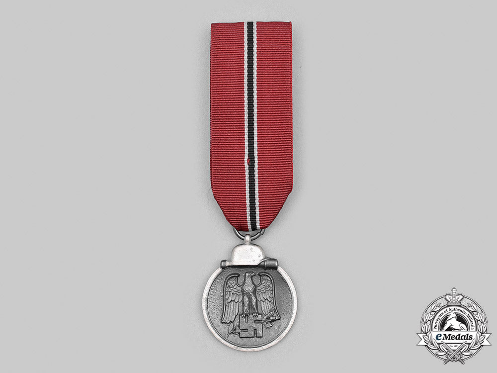 germany,_wehrmacht._an_eastern_front_medal,_with_award_document,_to_major_hermann_müller_m20_2922_mnc8973