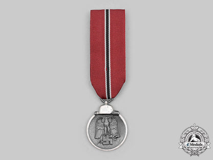 germany,_wehrmacht._an_eastern_front_medal,_with_award_document,_to_major_hermann_müller_m20_2922_mnc8973