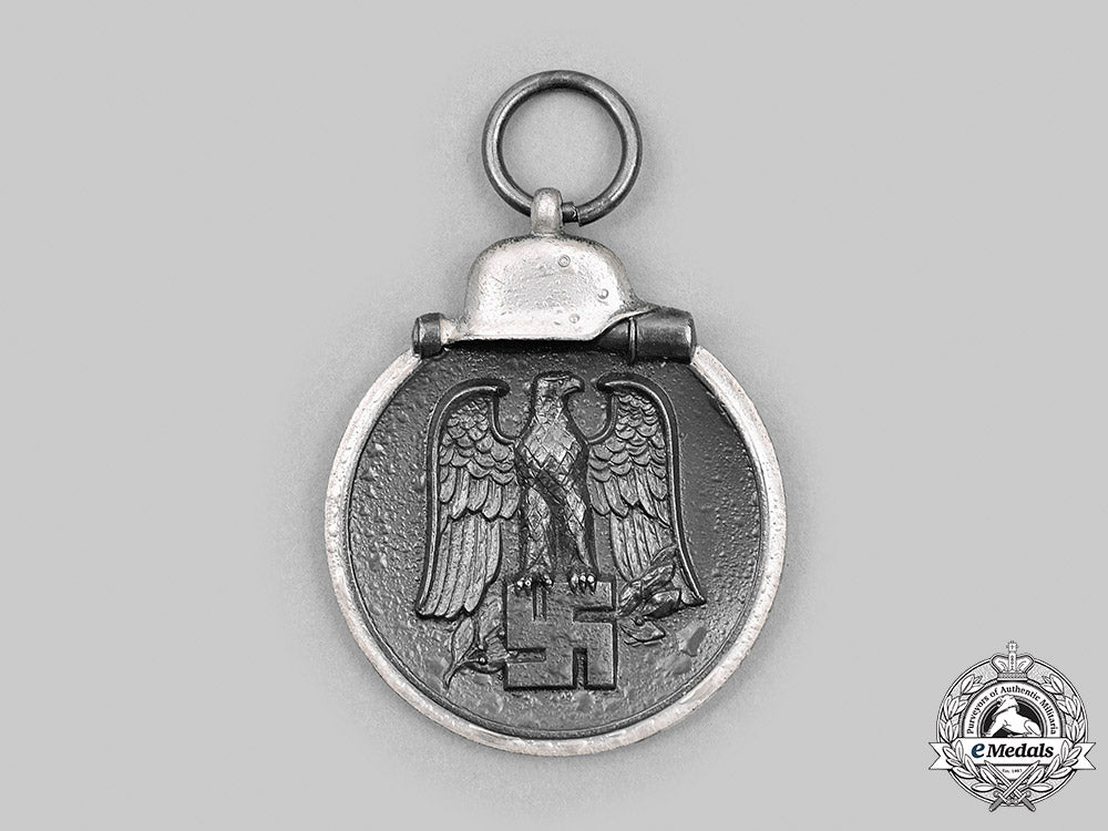 germany,_wehrmacht._an_eastern_front_medal,_with_award_document,_to_major_hermann_müller_m20_2923_mnc8977