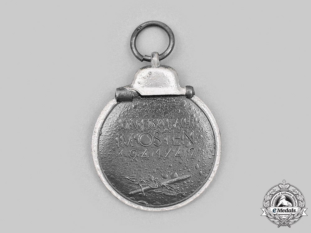 germany,_wehrmacht._an_eastern_front_medal,_with_award_document,_to_major_hermann_müller_m20_2924_mnc8979