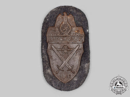 germany,_wehrmacht._an_army_issued_demjansk_shield_m20_305_mnc4678