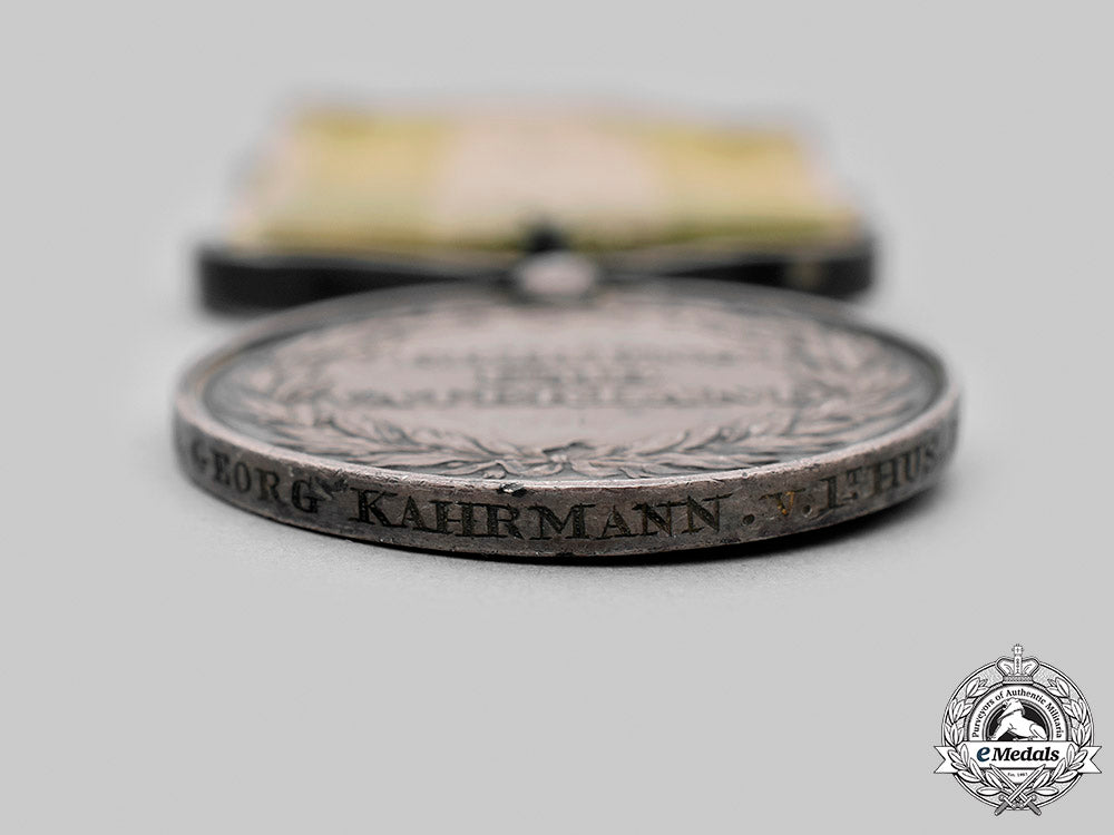 united_kingdom._a_rare_napoleonic_wars_guelphic_medal_group_to_george_kahrmann,1_st_hussars,_kgl,_for_gallantry_at_salamanca._m20_3331_mnc1291_1