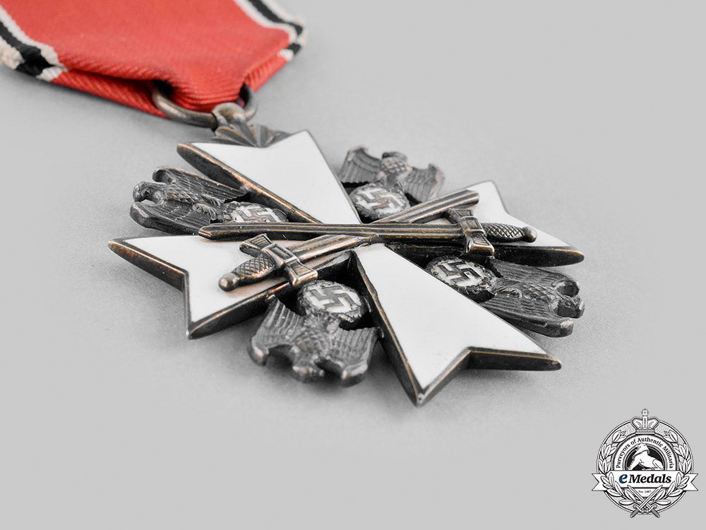 germany,_third_reich._an_order_of_the_german_eagle,_iii_class_cross_with_swords,_by_c.f._zimmermann_m20_828_mnc2492_1