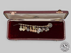 France, Republic. A Superb Colonial Service Miniature Chain, C. 1950