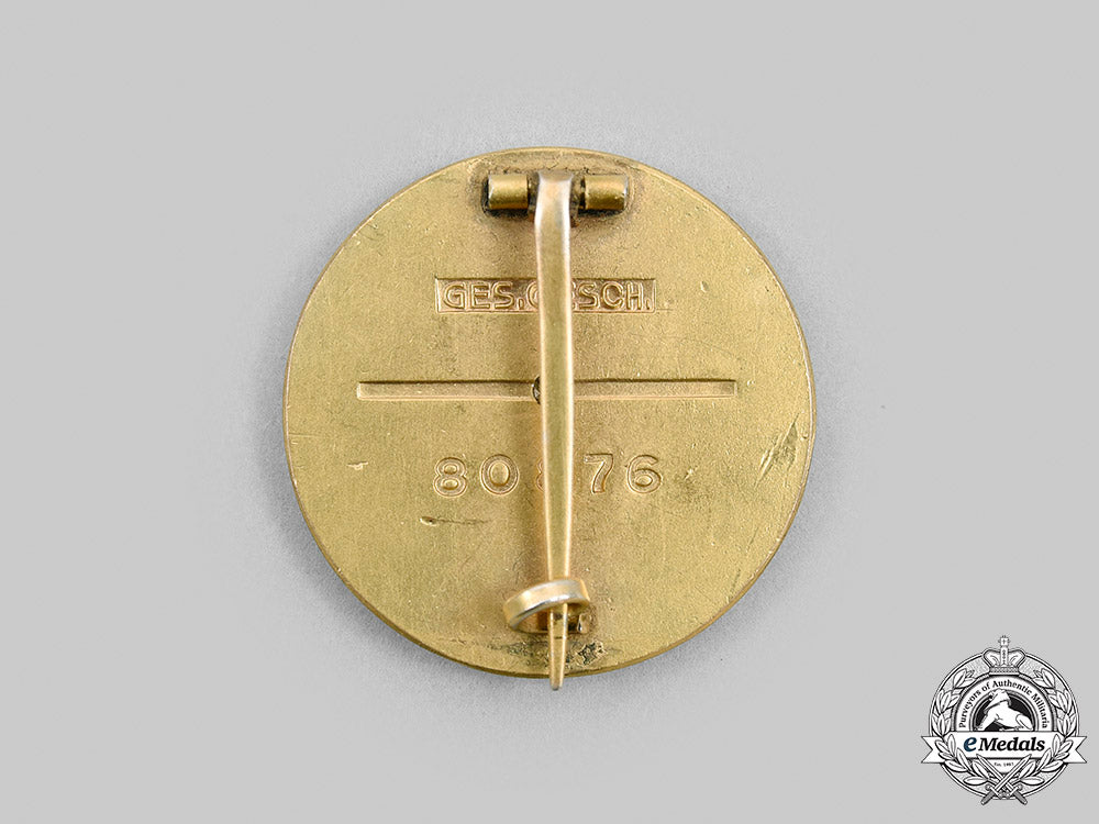 germany,_nsdap._a_golden_party_badge,_large_version,_by_deschler&_sohn_m20_892_mnc1418_1