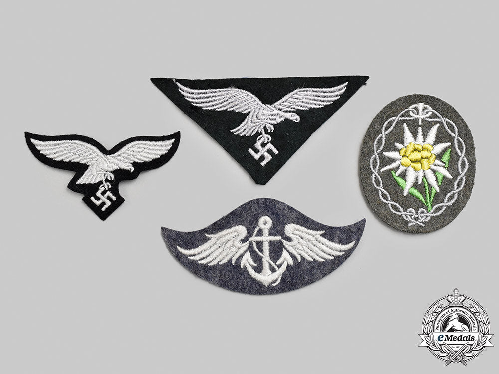 germany,_wehrmacht._a_mixed_lot_of_uniform_insignia_m21_2016