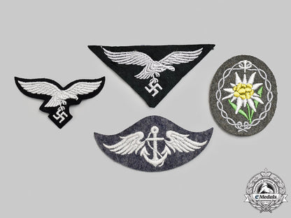 germany,_wehrmacht._a_mixed_lot_of_uniform_insignia_m21_2016