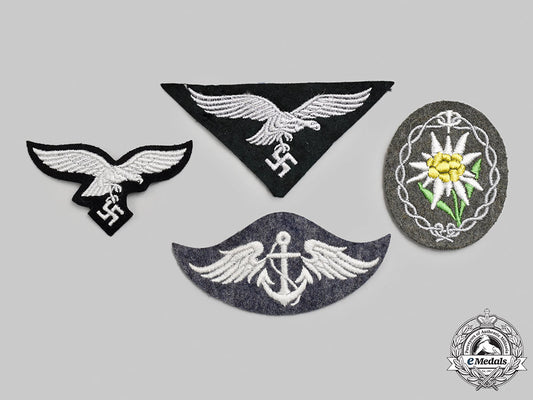 germany,_wehrmacht._a_mixed_lot_of_uniform_insignia_m21_2016