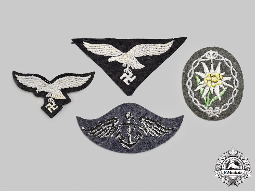 germany,_wehrmacht._a_mixed_lot_of_uniform_insignia_m21_2017