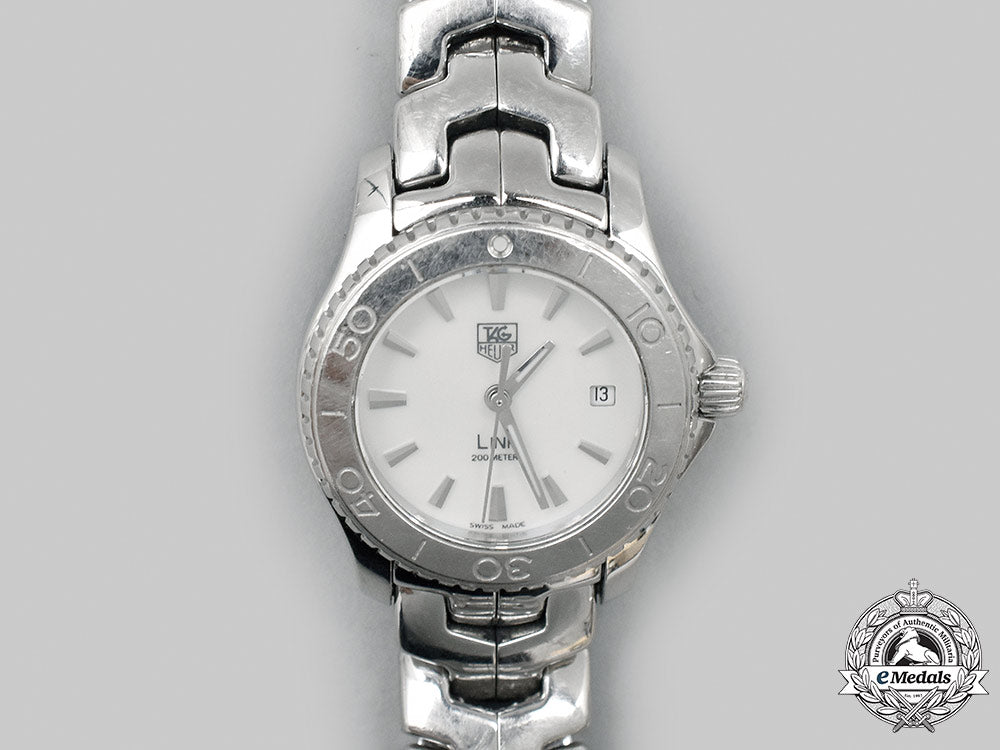 switzerland._a_stainless_steel_and_mother_of_pearl_watch,_by_tag_heuer_m21_263_1