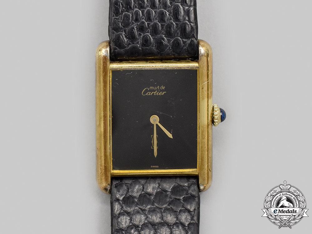 switzerland._a_vintage_gold_vermeil_cartier_watch,_c.1980_m21_267_1