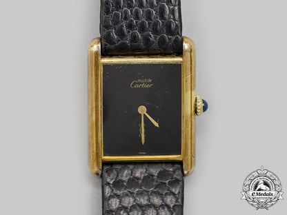 switzerland._a_vintage_gold_vermeil_cartier_watch,_c.1980_m21_267_1