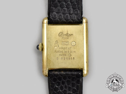 switzerland._a_vintage_gold_vermeil_cartier_watch,_c.1980_m21_268_1