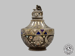 Puebloan. A Silver Zuni Inlay Kachina Jar C.1950