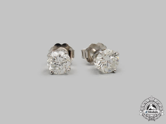 jewellery._a_pair_of_white_gold_round_brilliant_cut_diamond_stud_earrings_m21__mnc2465_1