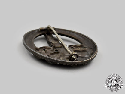 germany,_wehrmacht._a_rare_anti-_partisan_badge,_bronze_grade,_by_c.e._juncker_m21__mnc6717_0924