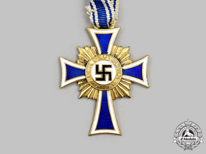 germany,_third_reich._an_honour_cross_of_the_german_mother,_gold_grade_with_case,_by_glaser&_sohn_m21__mnc9128
