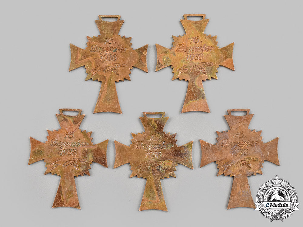 germany,_third_reich._a_lot_of_factory_unfinished_honour_cross_of_the_german_mother_m21__mnc9134_1_1_1