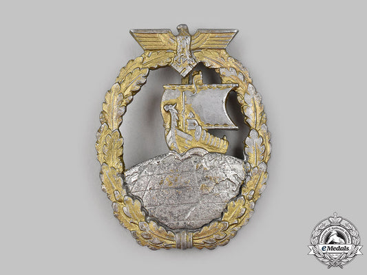 germany,_kriegsmarine._an_auxiliary_cruiser_war_badge,_by_schwerin&_sohn_m21_mnc5538_1