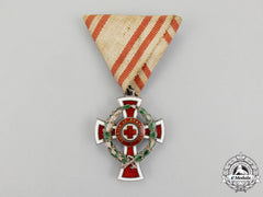 Austria. An Austrian Honour Decoration Of The Red Cross, 2Nd Class Cross With War Decoration