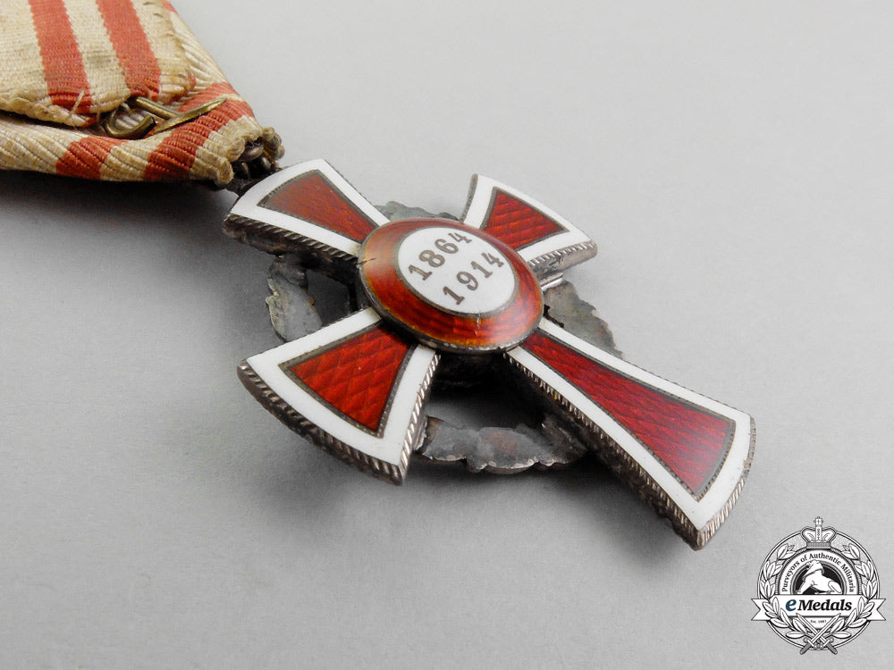 austria._an_austrian_honour_decoration_of_the_red_cross,2_nd_class_cross_with_war_decoration_m_636_1_1