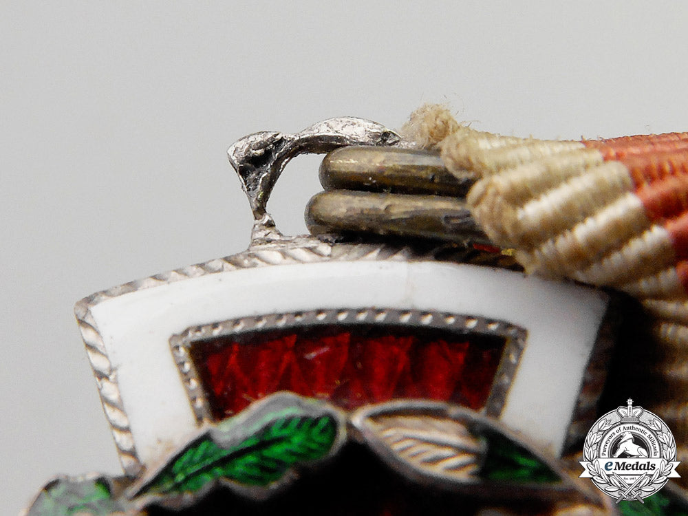 austria._an_austrian_honour_decoration_of_the_red_cross,2_nd_class_cross_with_war_decoration_m_637_1_1