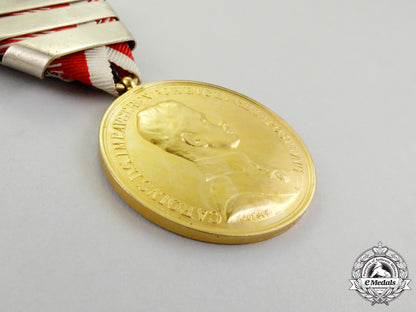austria._an_austrian_bravery_medal,_gold_grade_with_three_clasps,_type_iv(_karl_i,1917-1918)_m_742_1