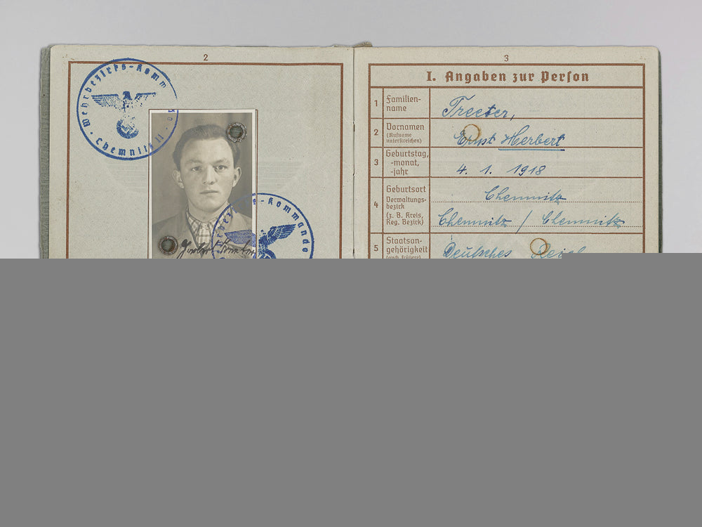 a_wehrpass_to_the31_st_grenadier-_regiment;_recipient_of_gold_grade_wound_badge_m_852