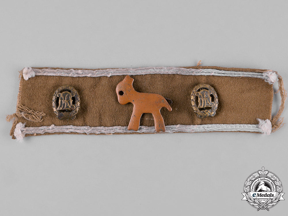germany,_third_reich._an_afrika_cuff_title_section_with_possible_unit_badge&_d_r_l_sports_badges_ma18_0038_1_1_1_1