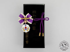 Japan. A  Patriotic Women's Association (Aikoku Fujinkai) Distinguished Service Badge In Case