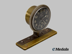 Germany, Luftwaffe. A Board Clock, With Stand, By Junghans