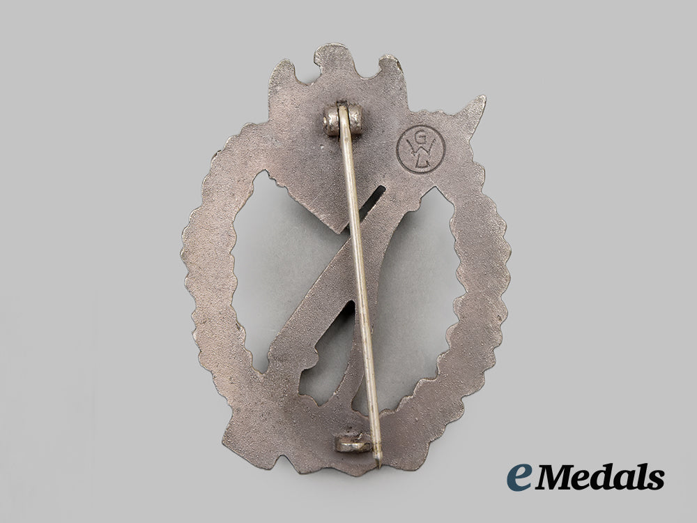 germany,_wehrmacht._a_mint_infantry_assault_badge,_silver_grade,_by_gebrüder_wegerhoff__mnc6557