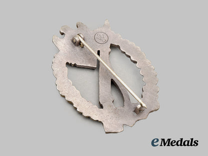germany,_wehrmacht._a_mint_infantry_assault_badge,_silver_grade,_by_gebrüder_wegerhoff__mnc6557b
