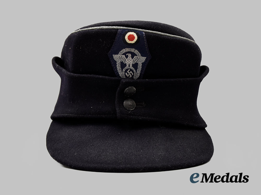 germany,_third_reich._a_volunteer_firefighter_officer’s_visored_field_cap__mnc6577_1