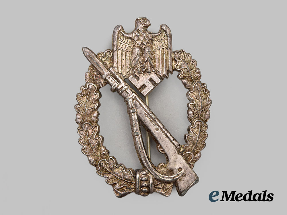 germany,_wehrmacht._an_infantry_assault_badge,_silver_grade,_mk-_marked__mnc6595